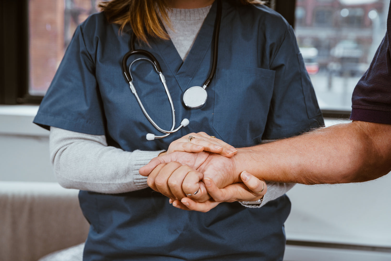 nurse-helping-patient