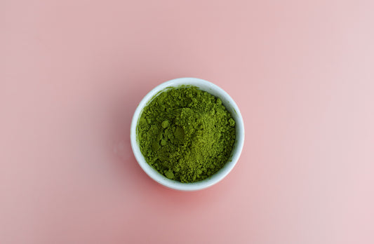 Matcha green tea powder in a pot