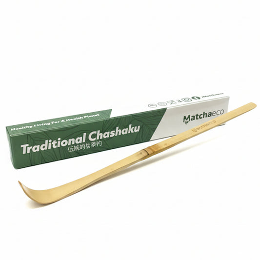 Wooden chashaku with green packaging labeled 'Traditional Chashaku' and 'Matchaeco' on a white background.