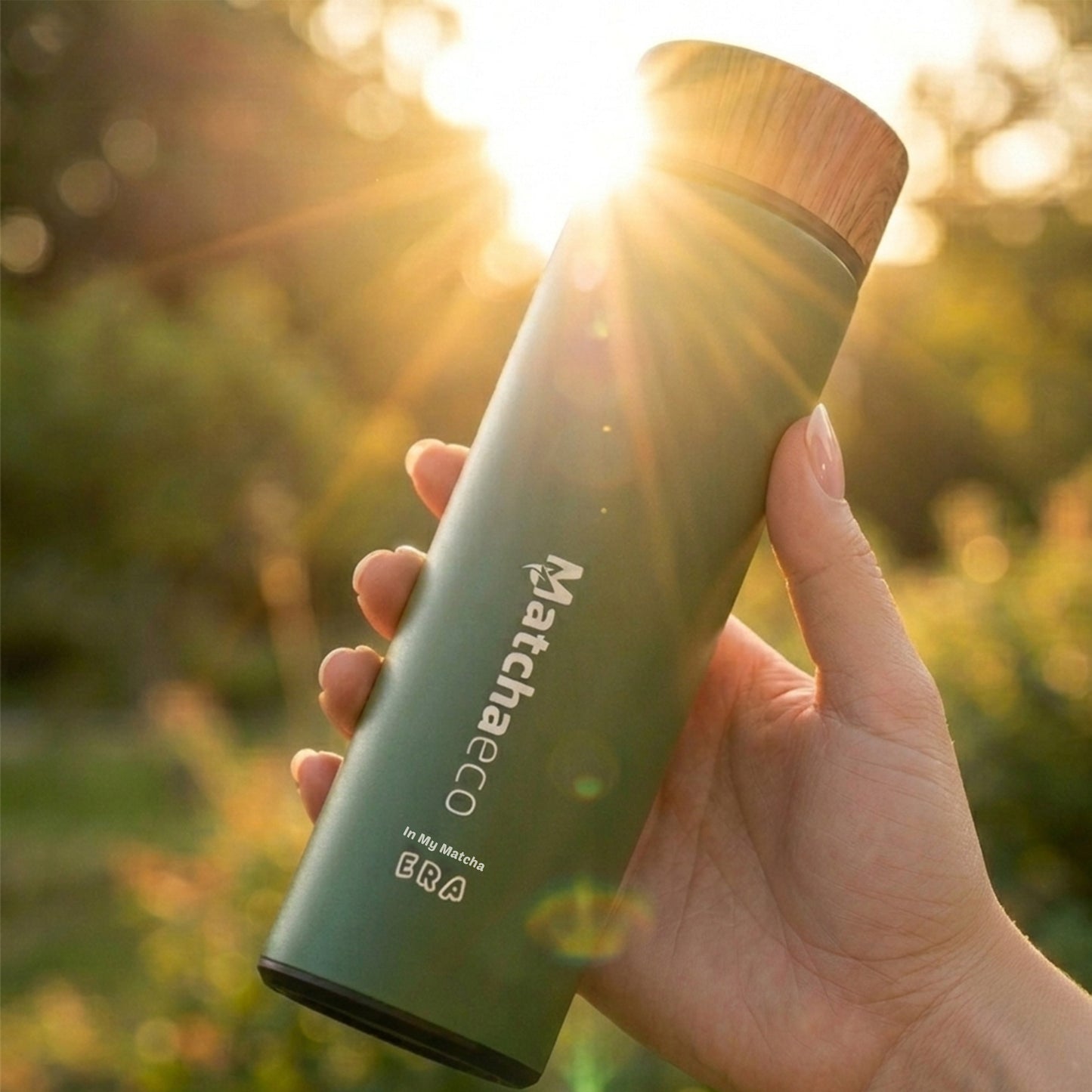 Matchaeco insulated flask being held up to the sun