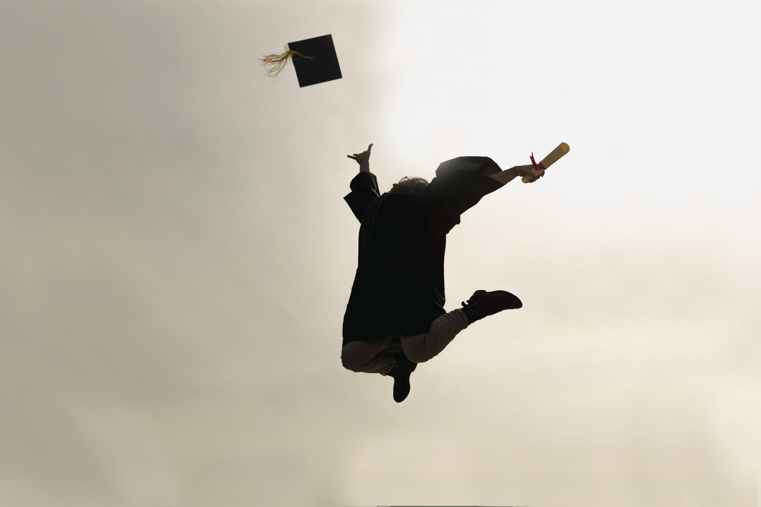 Student jumping celebrating